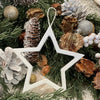 FR-3809 - Sm. White Glitter Hollow Star Ornie