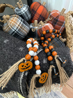 CA-4773 - OW Pumpkin Cutout Tassel